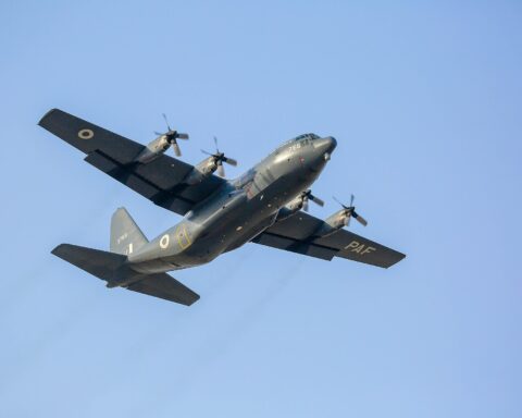 Pakistan Air Force C-130 Hercules transport aircraft in flight, marked PAF — the same fleet type used to transport military equipment to Saudi Arabia under the September 2025 mutual defence pact