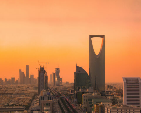 Riyadh skyline showing King Abdullah Financial District and Kingdom Tower at sunset, Saudi Arabia