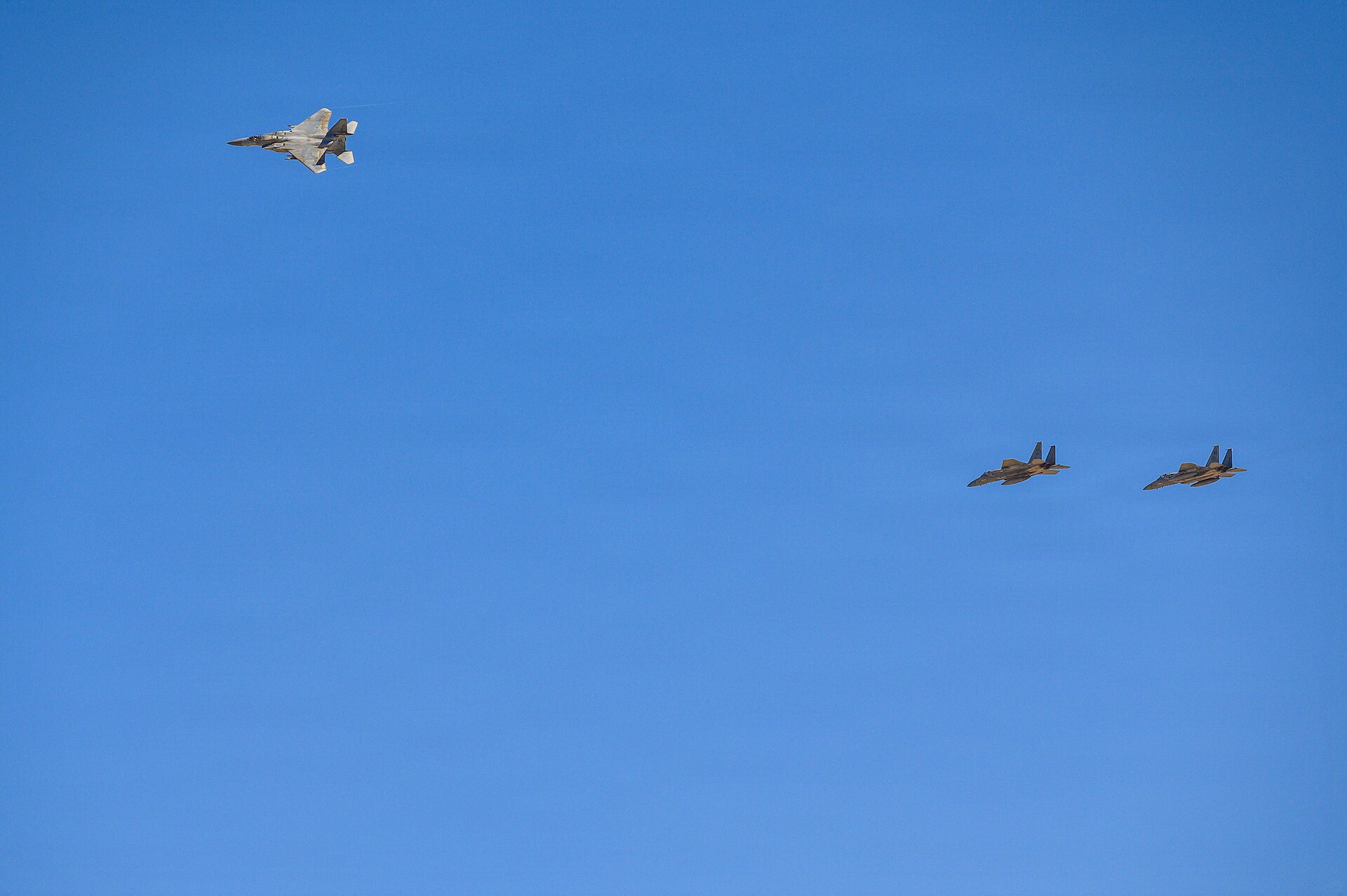 Royal Saudi Air Force F-15 aircraft fly over a Middle East base during exercise Spears of Victory, February 2026 — the RSAF conducted covert strikes on Iranian territory in late March 2026