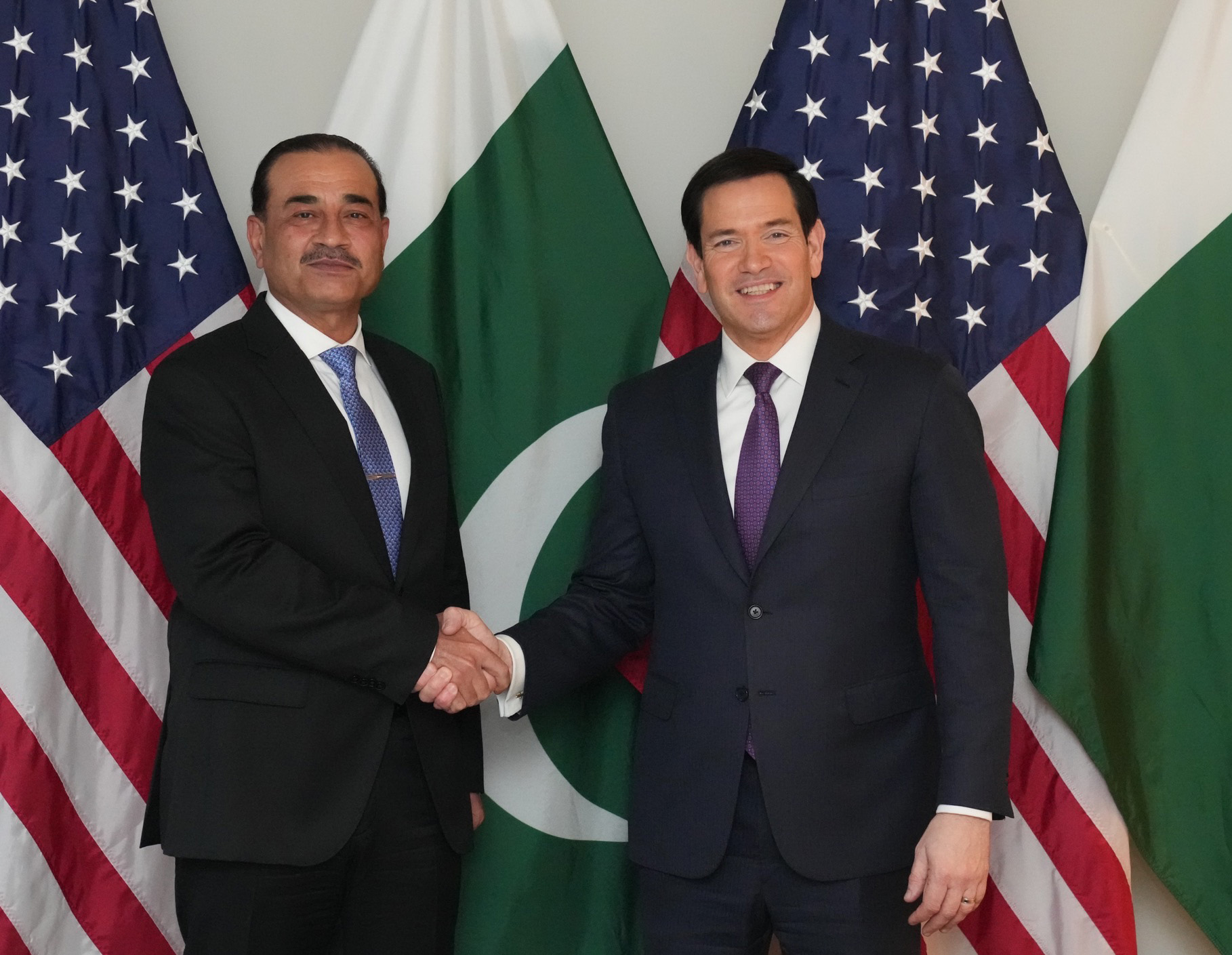 Pakistan Army Chief General Asim Munir meets US Secretary of State Marco Rubio in Munich February 2026, Pakistan and US flags in background