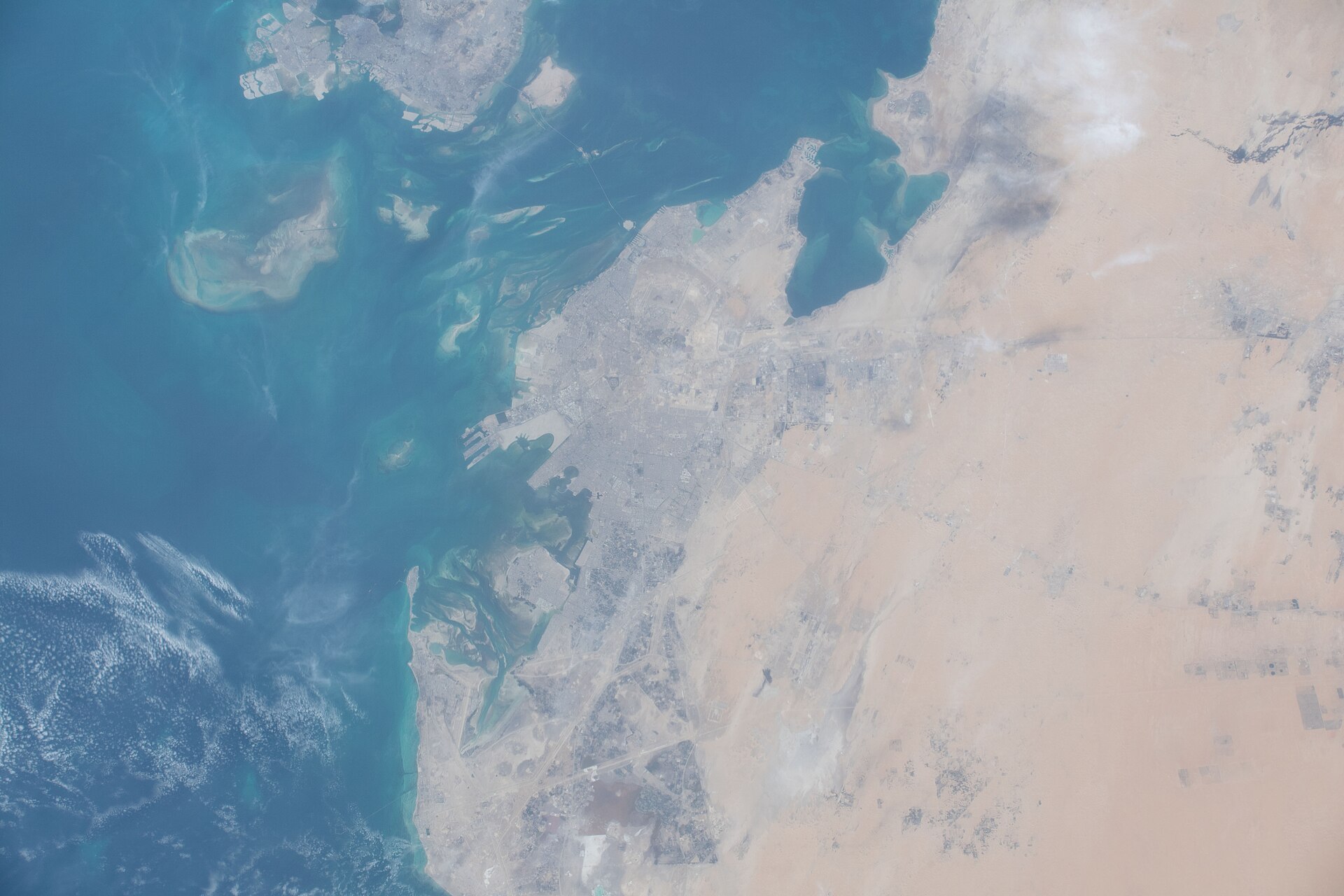 Saudi Arabia Eastern Province coastline on the Persian Gulf photographed from the International Space Station — Ras Tanura, the world largest oil export terminal, sits along this coast.
