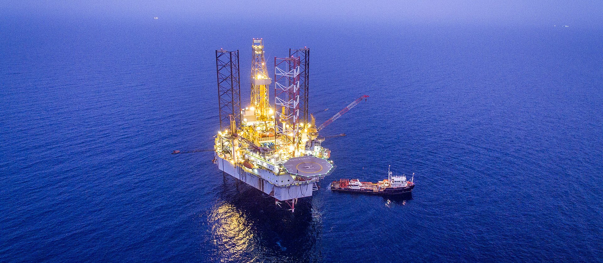 South Pars offshore gas platform in the Persian Gulf at dusk, the Iranian half of the world largest gas field and a condensate export chokepoint