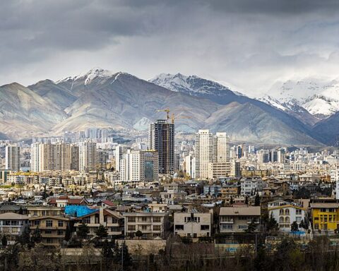 Tehran skyline panorama with Alborz mountain range in the background. Iran nuclear negotiations 2026.