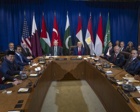 US President Donald Trump chairs a multilateral meeting with Arab and Muslim leaders at the United Nations, September 2025. Visible around the table: Turkish President Erdogan, Pakistani PM Shehbaz Sharif, Saudi FM Faisal bin Farhan, and Egyptian officials — the same four states now building the Turkey-Saudi-Egypt-Pakistan security quartet.