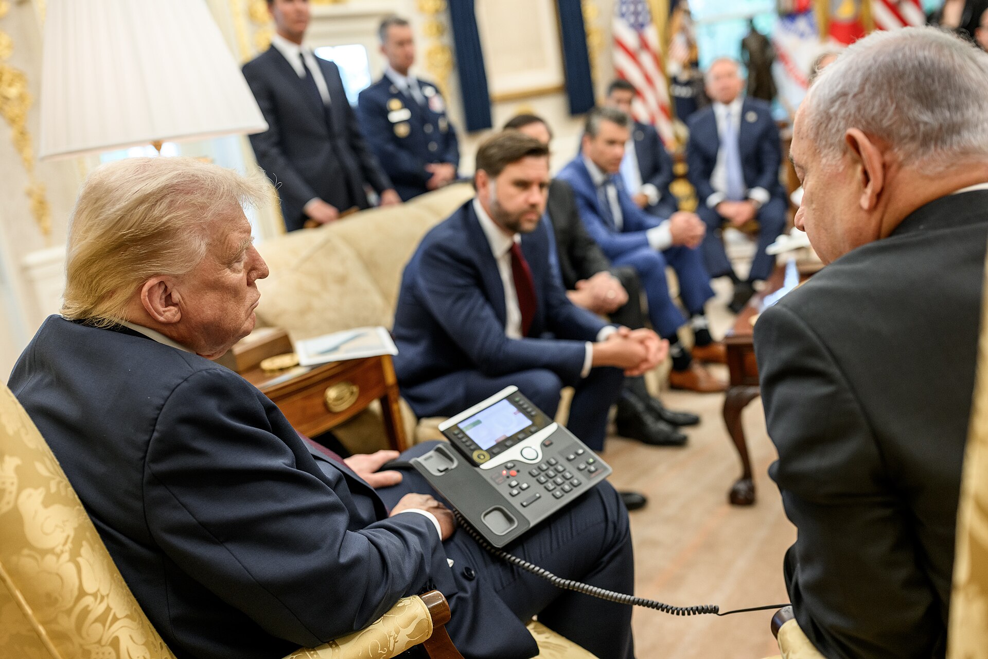 President Donald Trump in the Oval Office during a trilateral phone call with Middle East leaders on Iran peace negotiations, September 2025
