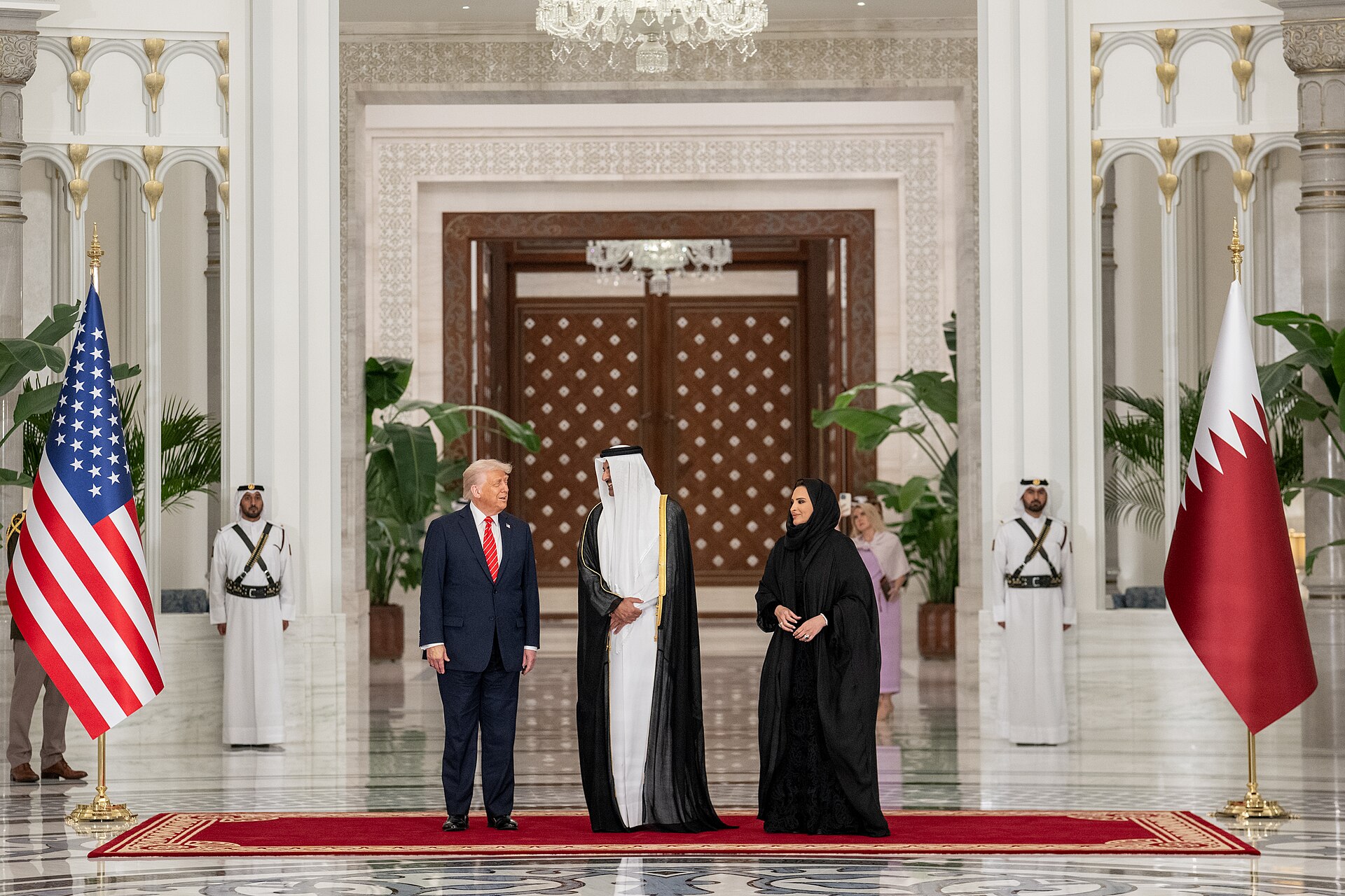 President Donald Trump greeted by Emir of Qatar Sheikh Tamim bin Hamad Al Thani at Lusail Palace in Doha during Trump state visit May 14 2025