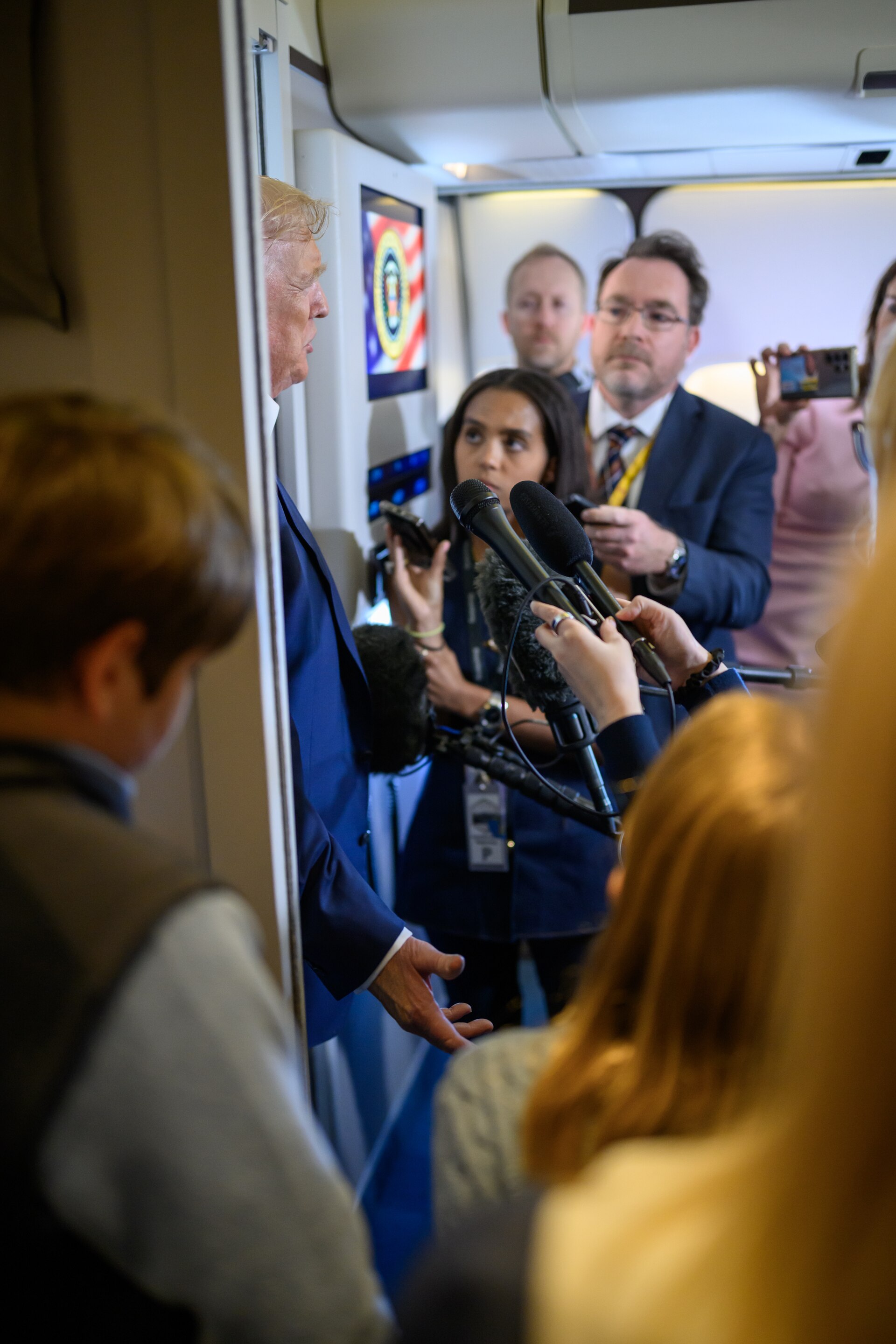 President Trump answering reporters questions aboard Air Force One en route to Joint Base Andrews