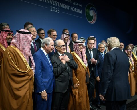 Trump at US-Saudi Investment Forum November 2025 with Saudi officials Elon Musk and Jensen Huang at Kennedy Center Washington DC