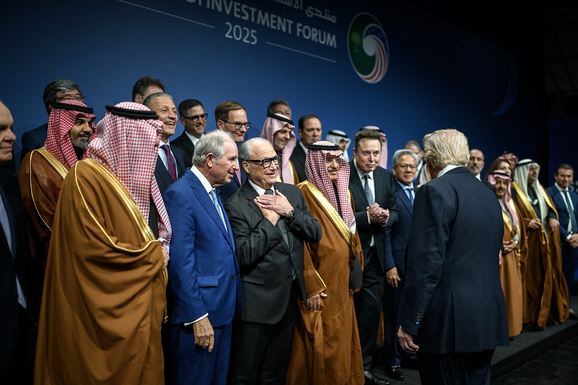 Trump at US-Saudi Investment Forum November 2025 with Saudi officials Elon Musk and Jensen Huang at Kennedy Center Washington DC