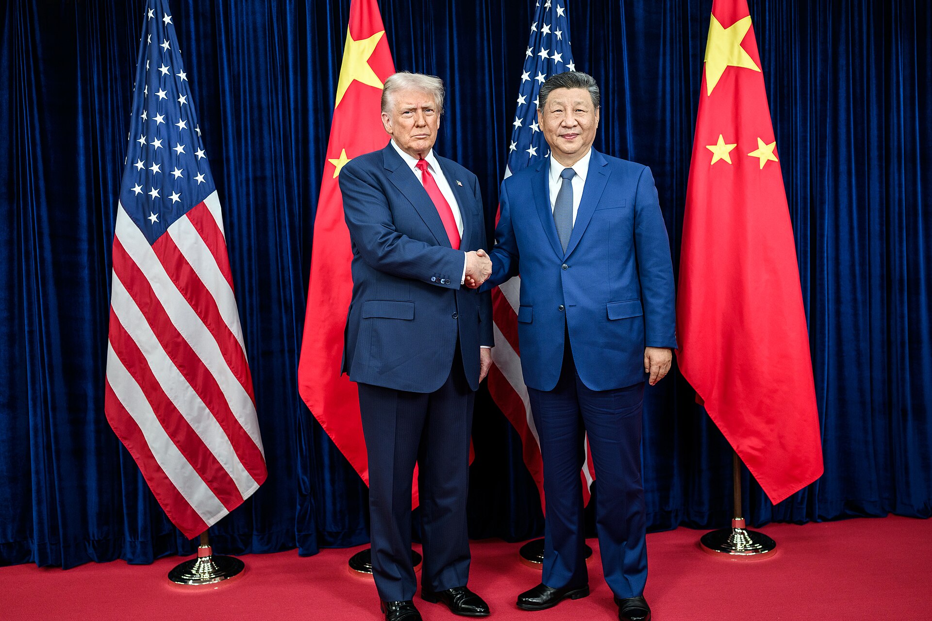President Trump and Chinese President Xi Jinping shake hands before bilateral meeting at Gimhae, 2025