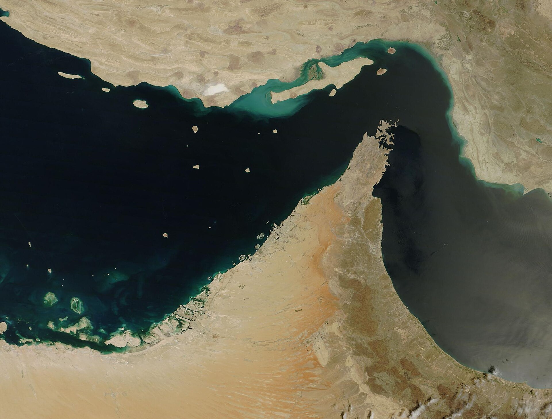 NASA MODIS satellite image of UAE, Oman, the Strait of Hormuz, and Gulf of Oman, showing the Musandam Peninsula and Fujairah coastline