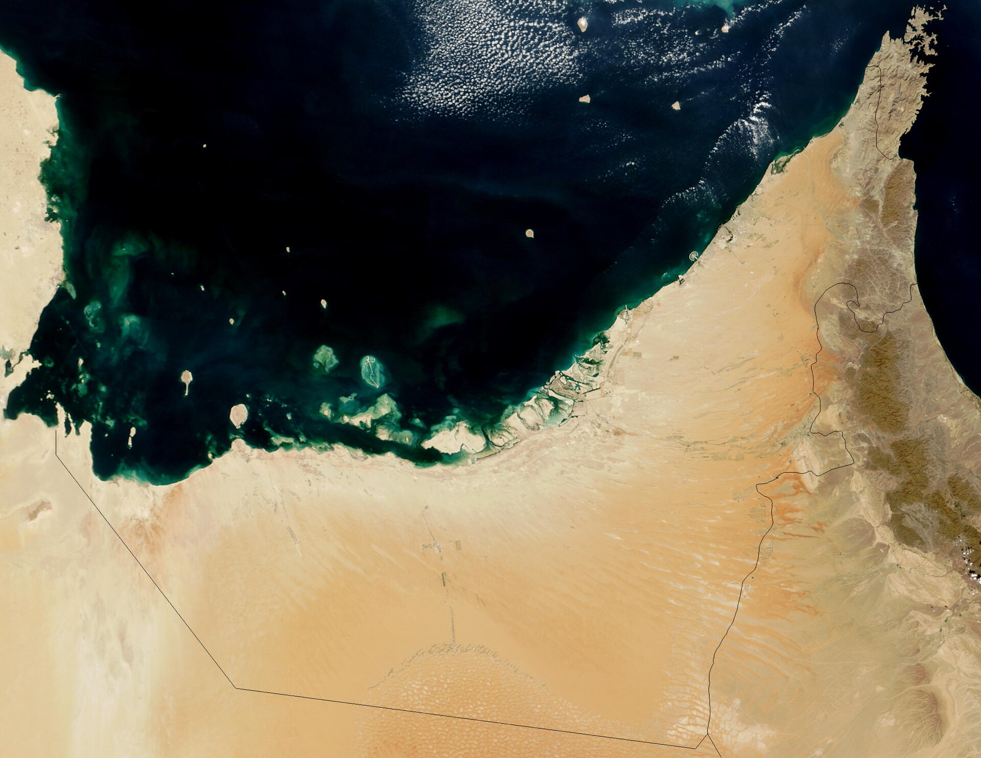 NASA satellite image of United Arab Emirates showing Persian Gulf coast and western Abu Dhabi Al Dhafra desert region
