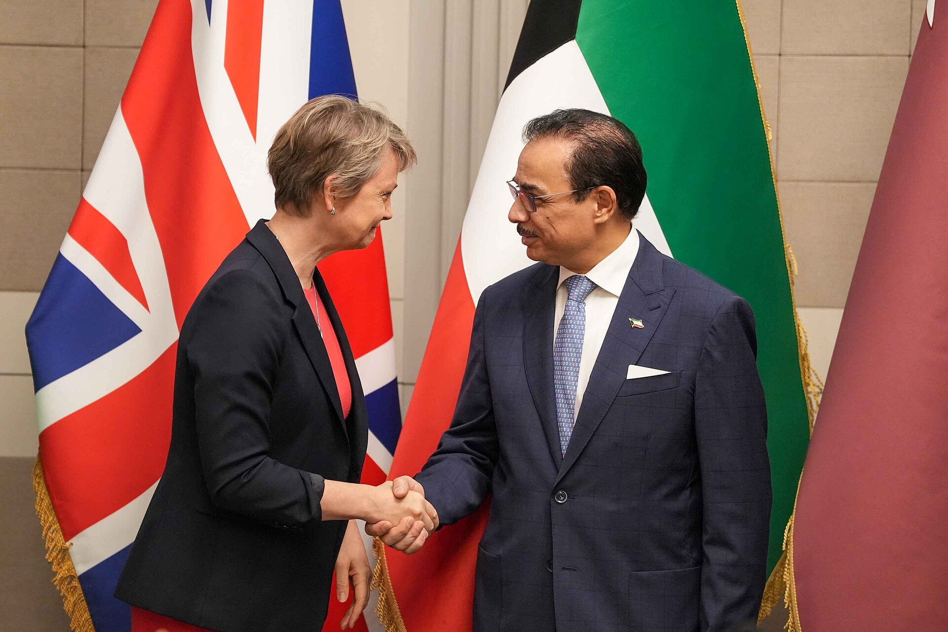 UK Foreign Secretary Yvette Cooper meets GCC foreign minister, UK and Kuwait flags behind them, at UN General Assembly September 2025 UK-GCC ministerial meeting