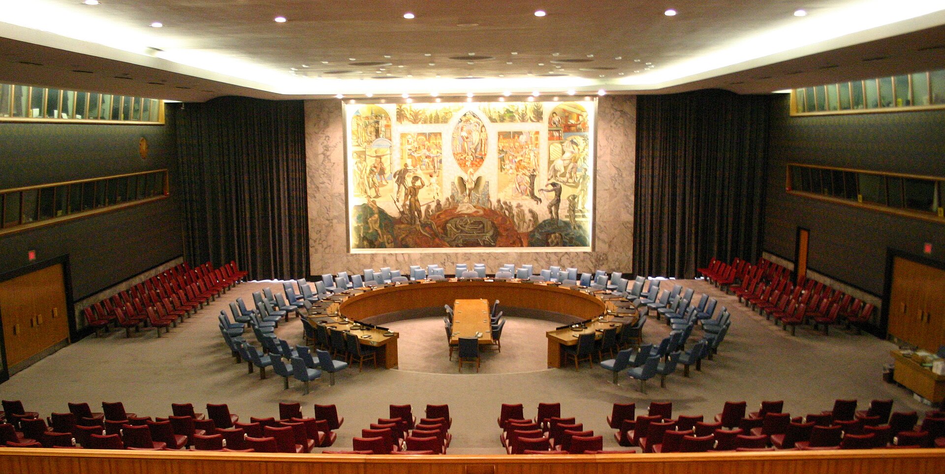 The UN Security Council chamber in New York showing the iconic horseshoe table and delegate seating, site of the April 7, 2026 Hormuz resolution veto by Russia and China