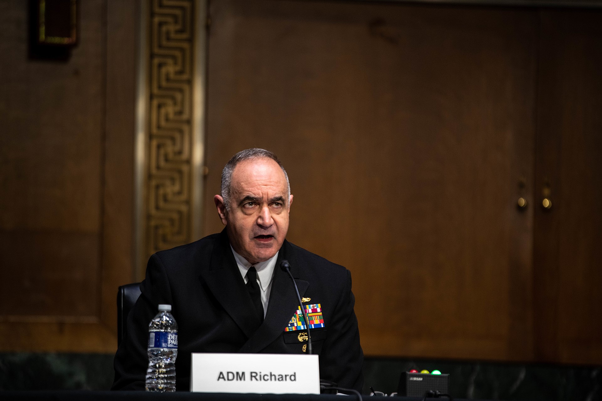 A US Navy admiral testifies before the Senate Armed Services Committee in Washington, DC — the same committee that was denied access to the Office of Legal Counsel opinion authorizing Operation Epic Fury