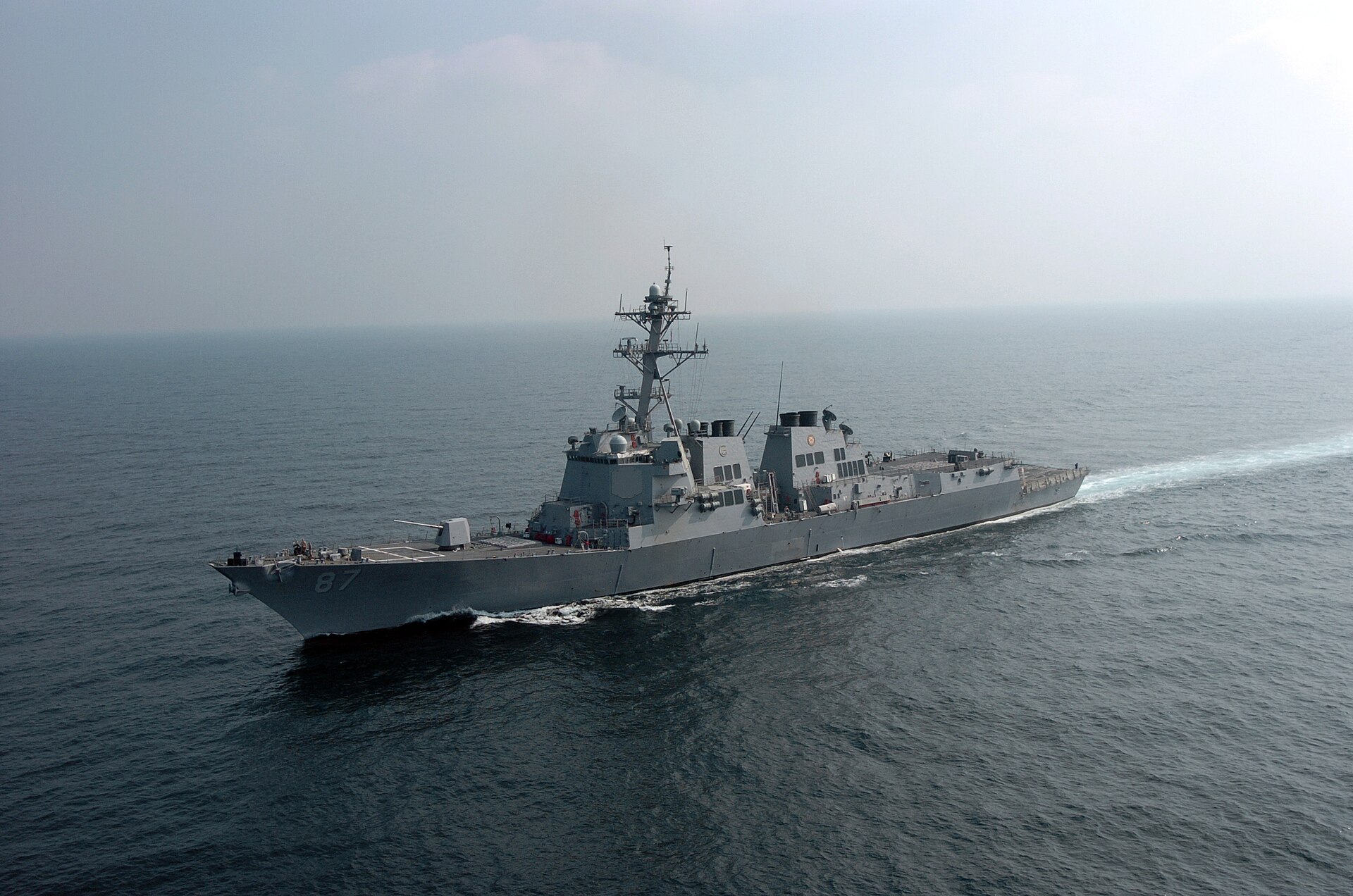 USS Mason (DDG-87), an Arleigh Burke-class guided-missile destroyer, patrols the Northern Persian Gulf — one of the two warships that transited the Strait of Hormuz under Project Freedom on May 4, 2026.