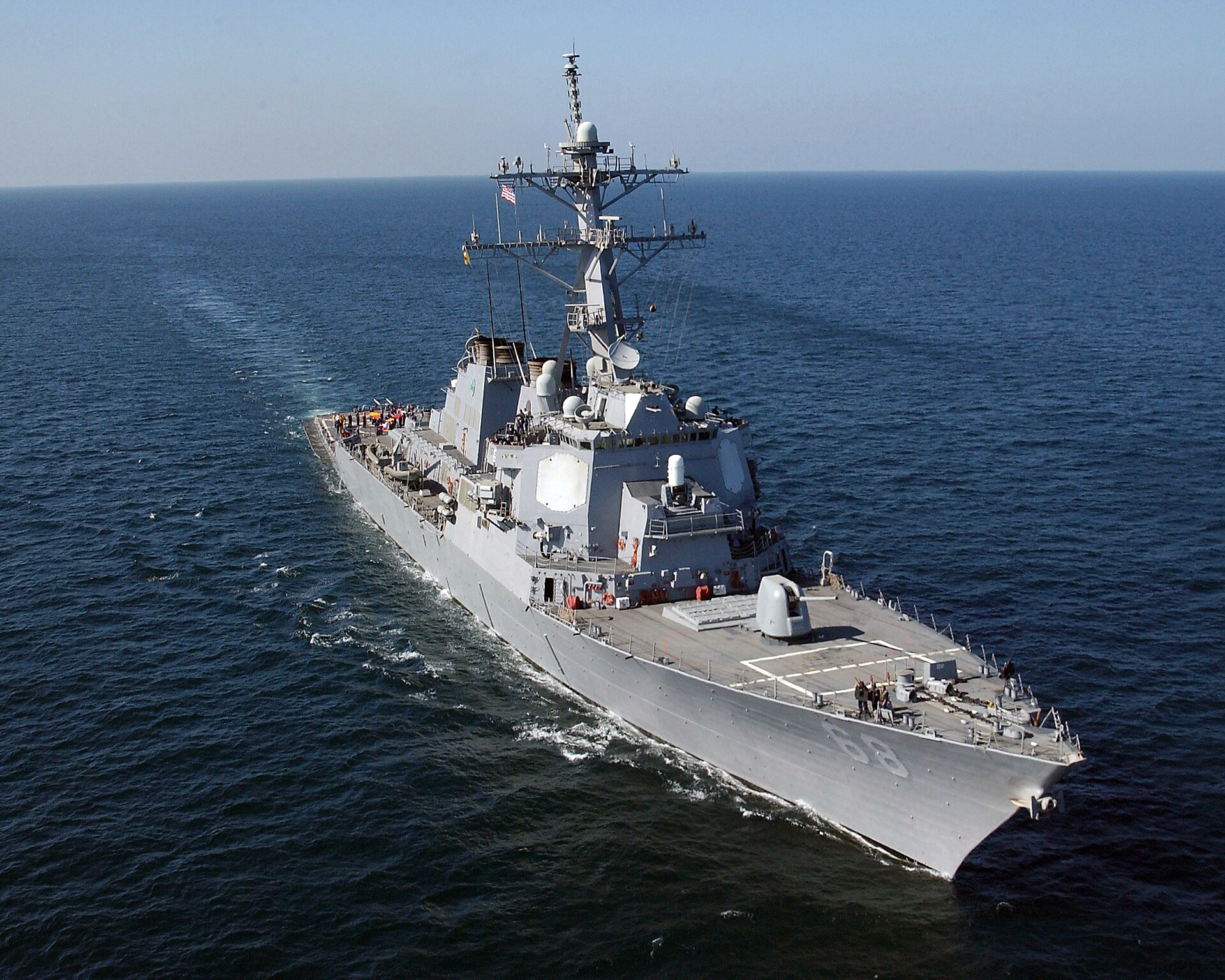 USS The Sullivans (DDG 68) patrols the Gulf of Oman under Task Force 150 — Project Freedom can dominate the surface of this approach corridor, but Iranian domestic statute governing Hormuz transit sits beyond any naval vessel's reach. Photo: U.S. Navy / Public Domain