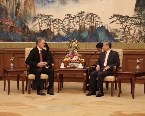 Wang Yi, Chinese Foreign Minister and Director of the Central Foreign Affairs Commission, in a bilateral meeting in Beijing, 2025 — the same reception room where he met Iran Foreign Minister Araghchi on May 6, 2026