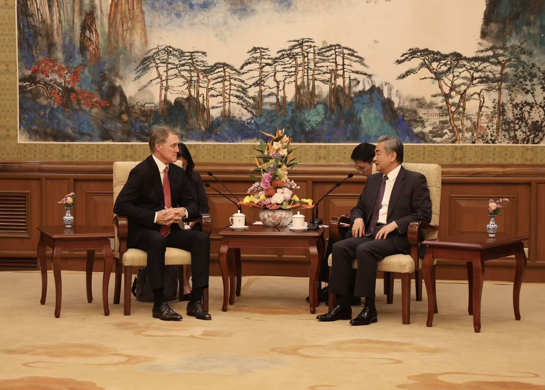 Wang Yi, Chinese Foreign Minister and Director of the Central Foreign Affairs Commission, in a bilateral meeting in Beijing, 2025 — the same reception room where he met Iran Foreign Minister Araghchi on May 6, 2026