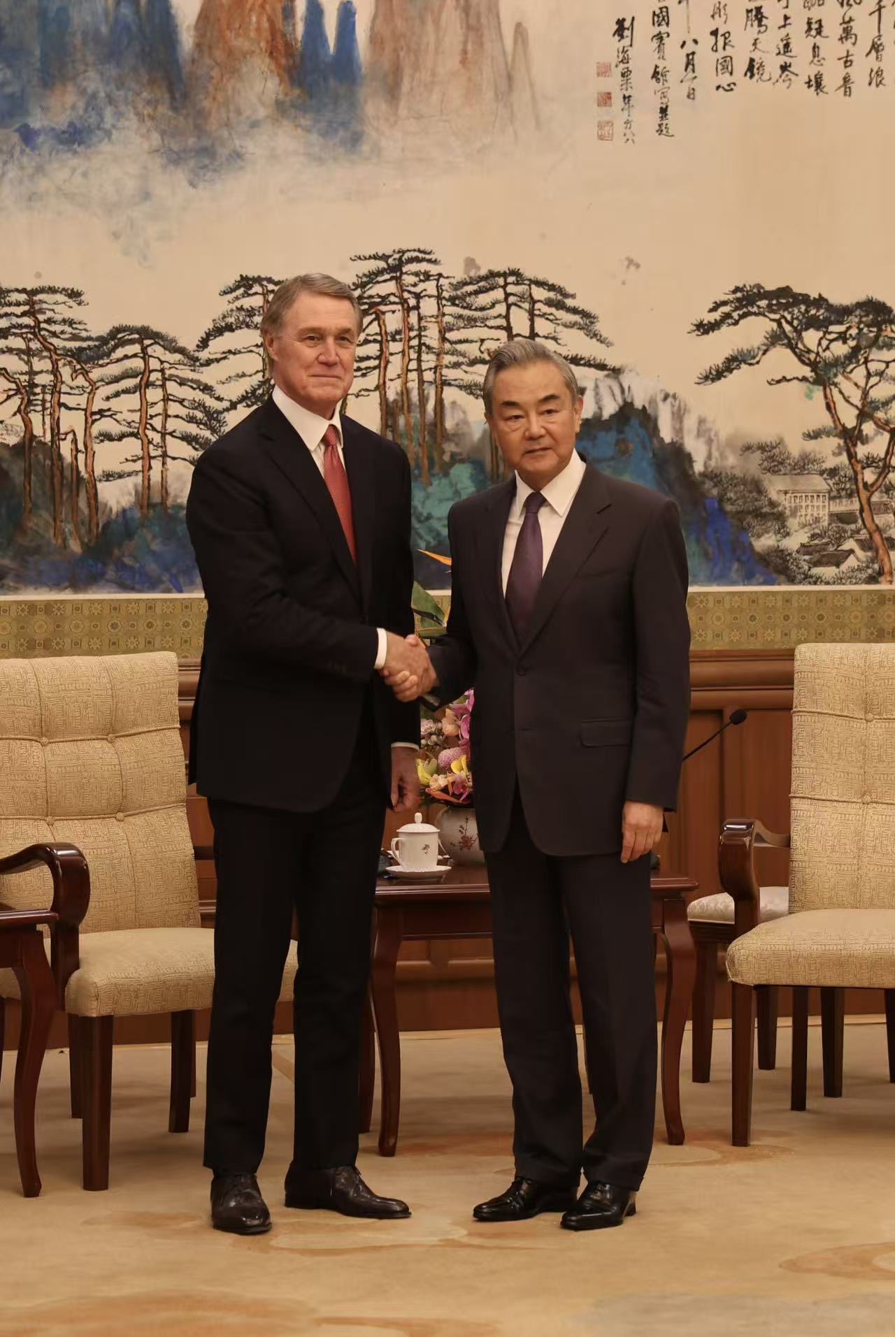Chinese Foreign Minister Wang Yi meets with US Ambassador David Perdue at Diaoyutai State Guesthouse, Beijing, 2025
