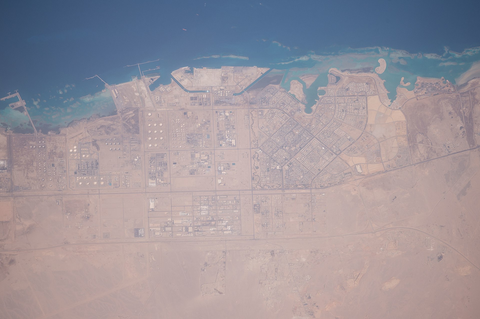 Yanbu terminal and loading pier on the Red Sea — ISS satellite image showing Saudi Arabia East-West Pipeline export terminus, capacity constrained at 4-5.9M bpd