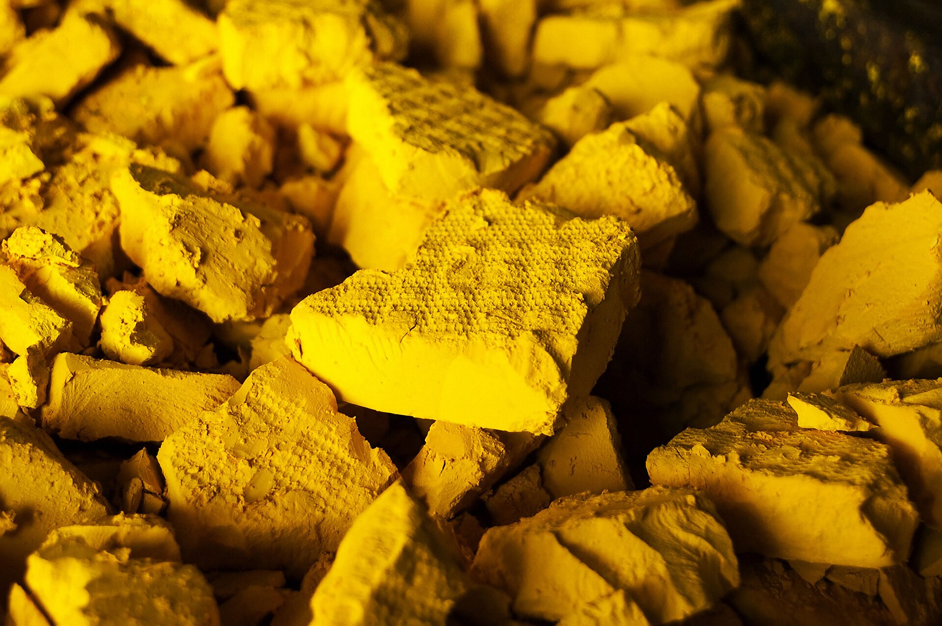 Yellowcake uranium oxide — the solid intermediate produced from uranium ore before it enters the enrichment process. Saudi Arabia surveys estimate 90,000 tonnes of uranium in the Arabian Shield