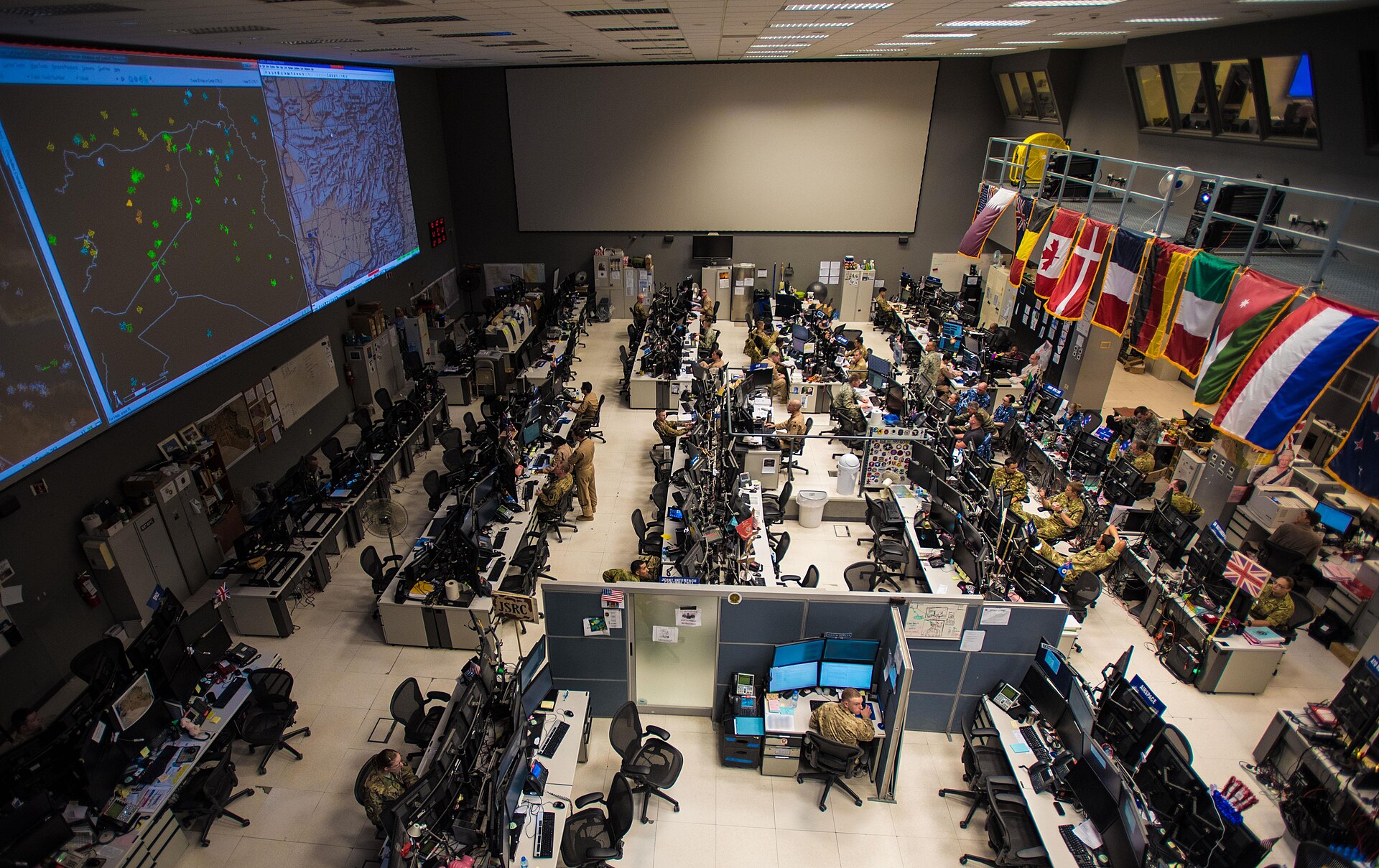 Combined Air Operations Center (CAOC) at Al Udeid Air Base Qatar, the CENTCOM nerve center for regional air operations now co-located with IRGC deconfliction personnel