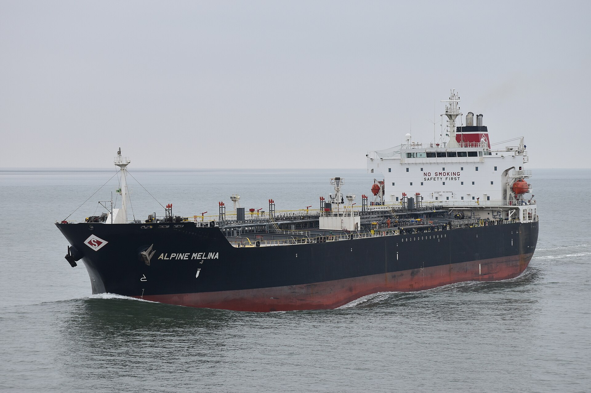 Commercial oil tanker Alpine Melina underway in the North Sea, representative of EU-insured crude carriers subject to PGSA sanctions