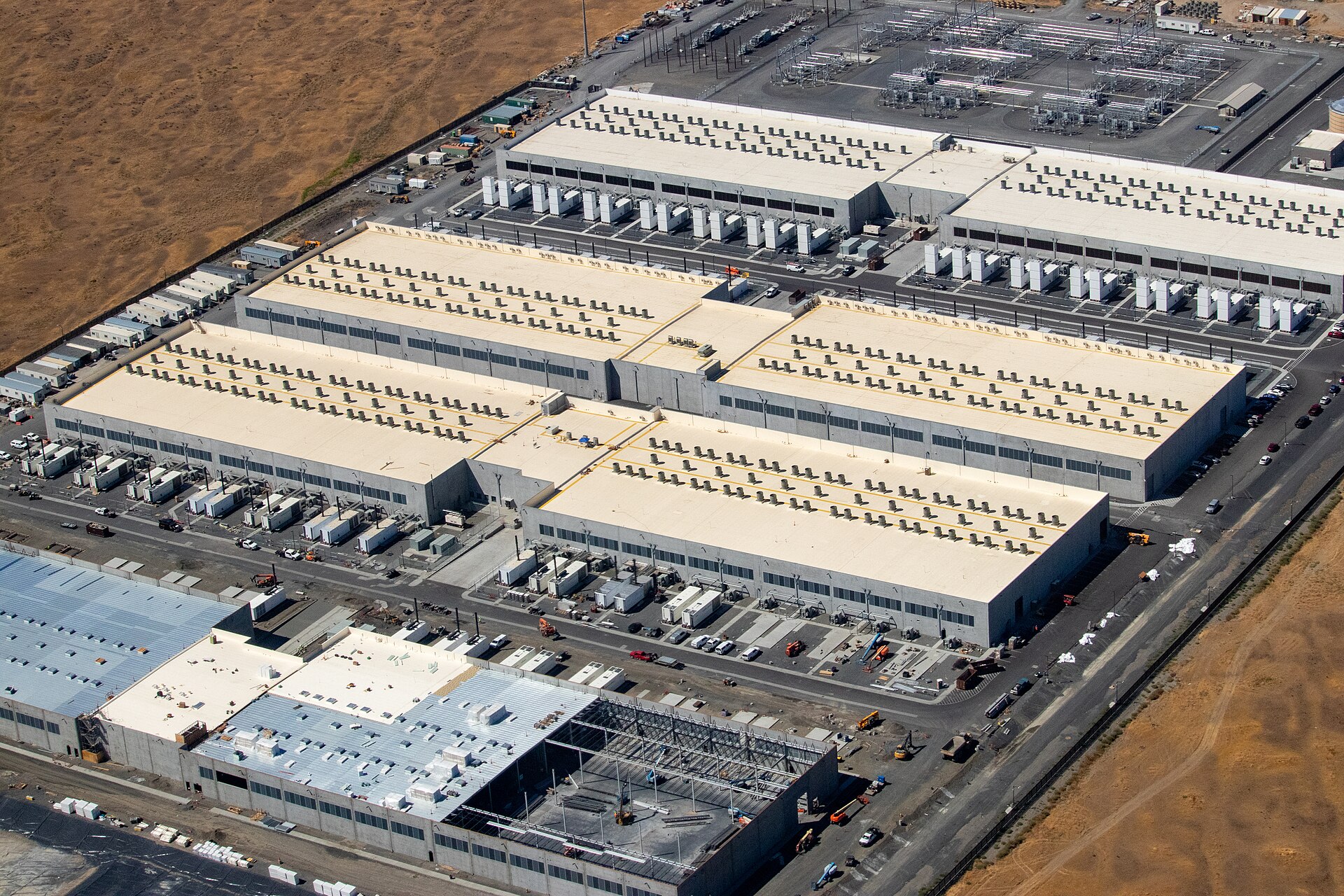 Aerial view of an Amazon AWS data center campus in the United States, showing the industrial scale of cloud computing infrastructure targeted by IRGC drone strikes in the UAE in March 2026