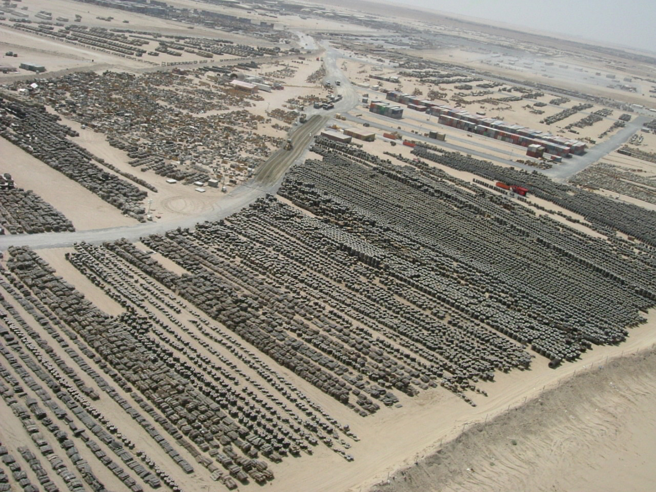 Camp Arifjan Kuwait US Army logistics staging area aerial view