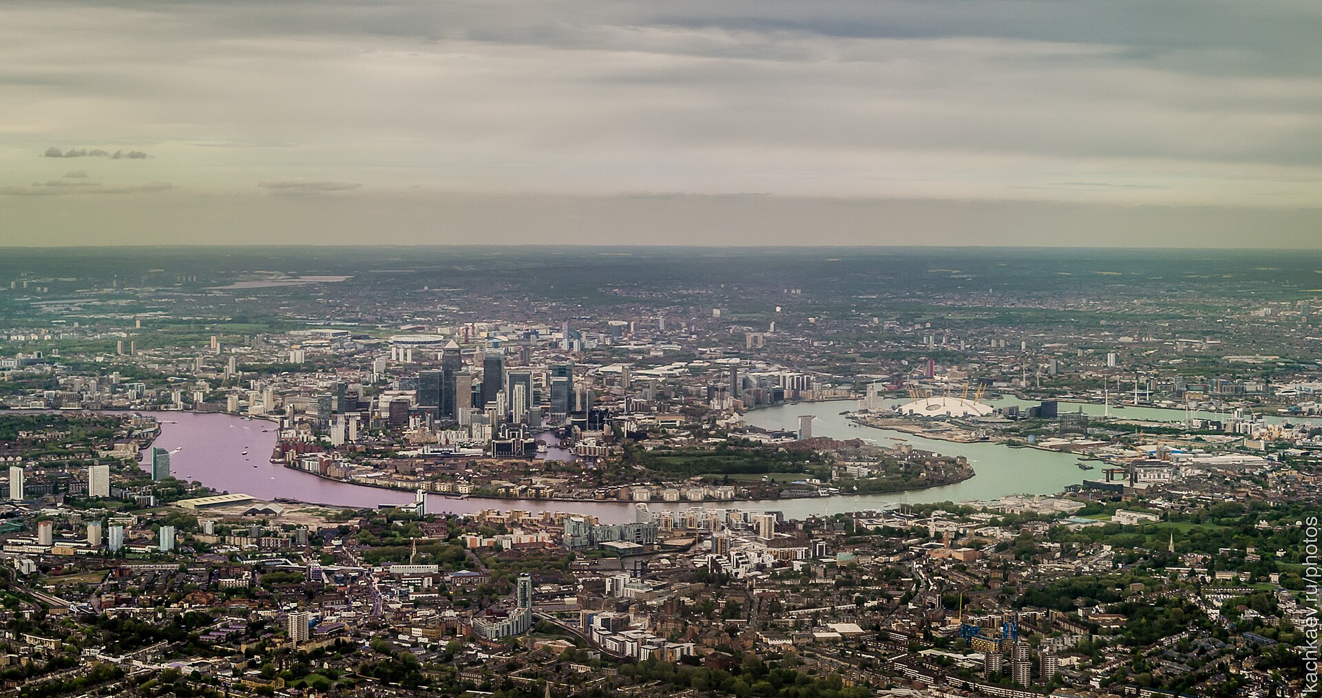 Canary Wharf, London's financial district — aerial view of the banking towers along the Thames, home to HSBC, Barclays, and other institutions in the 28-bank Sadara syndicate spanning seven jurisdictions. Photo: Alexander Kachkaev / CC BY 3.0