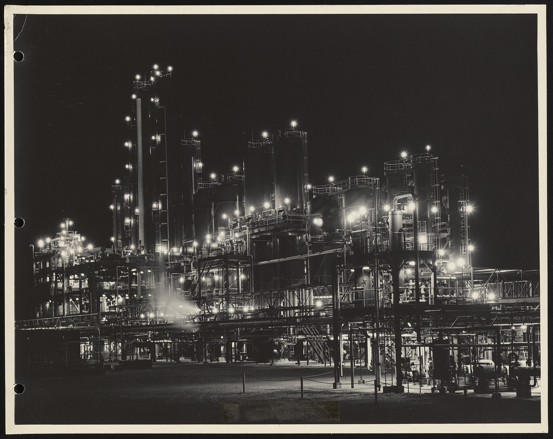 Dow Chemical Company's Vinyltoluene plant in Midland, Michigan, at night — the company's $1.295 billion Sadara guarantee liability has approached its June 15, 2026 contractual trigger without a dedicated SEC Form 8-K filing