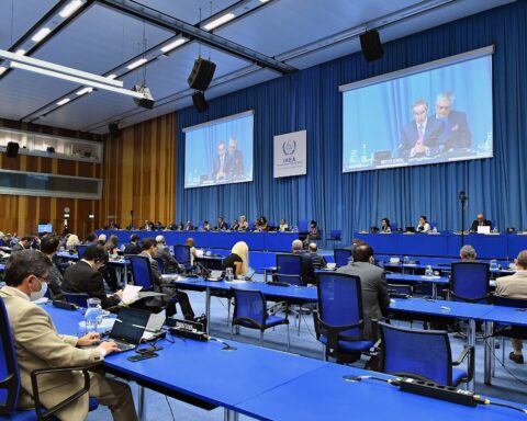 IAEA Director General Rafael Grossi addresses the Board of Governors at IAEA headquarters in Vienna during a formal plenary session, with delegates from 35 member states seated at blue tables