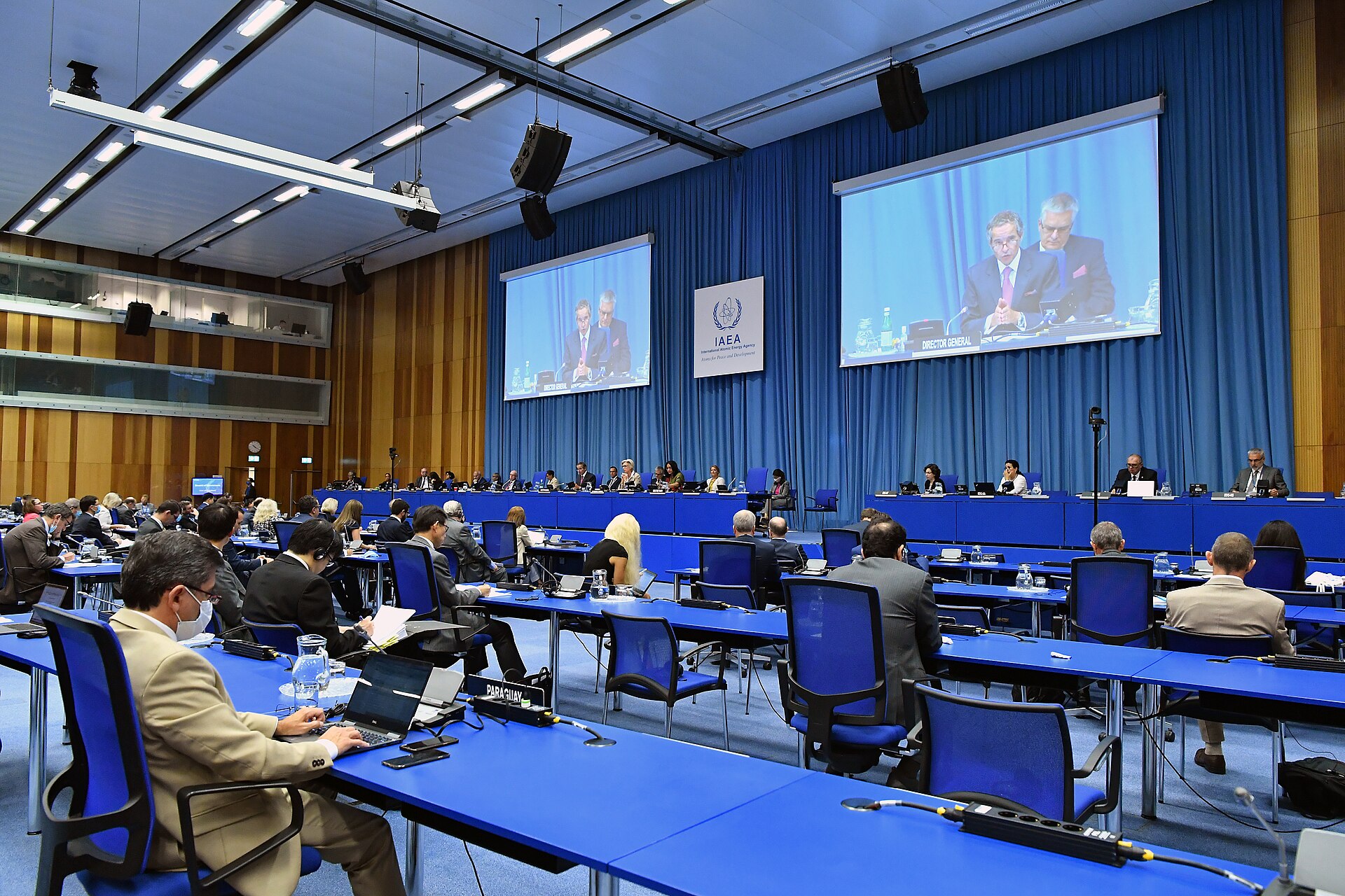 IAEA Director General Rafael Grossi addresses the Board of Governors at IAEA headquarters in Vienna during a formal plenary session, with delegates from 35 member states seated at blue tables