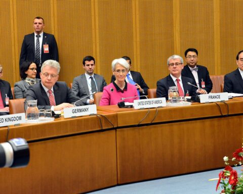 Under Secretary of State Wendy Sherman leads the US delegation at the opening plenary session of Iran nuclear talks in Vienna February 2014, with delegations from UK, Germany, France and China visible at the negotiating table