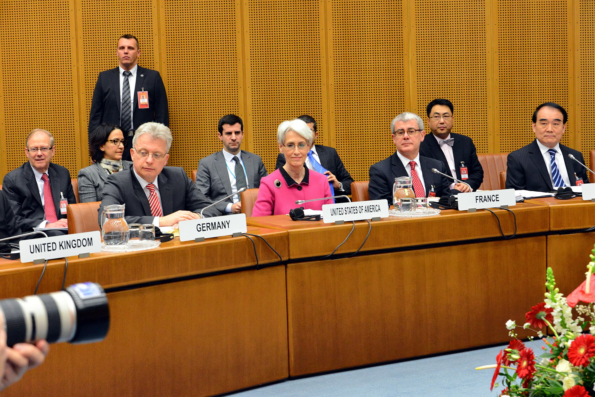Under Secretary of State Wendy Sherman leads the US delegation at the opening plenary session of Iran nuclear talks in Vienna February 2014, with delegations from UK, Germany, France and China visible at the negotiating table