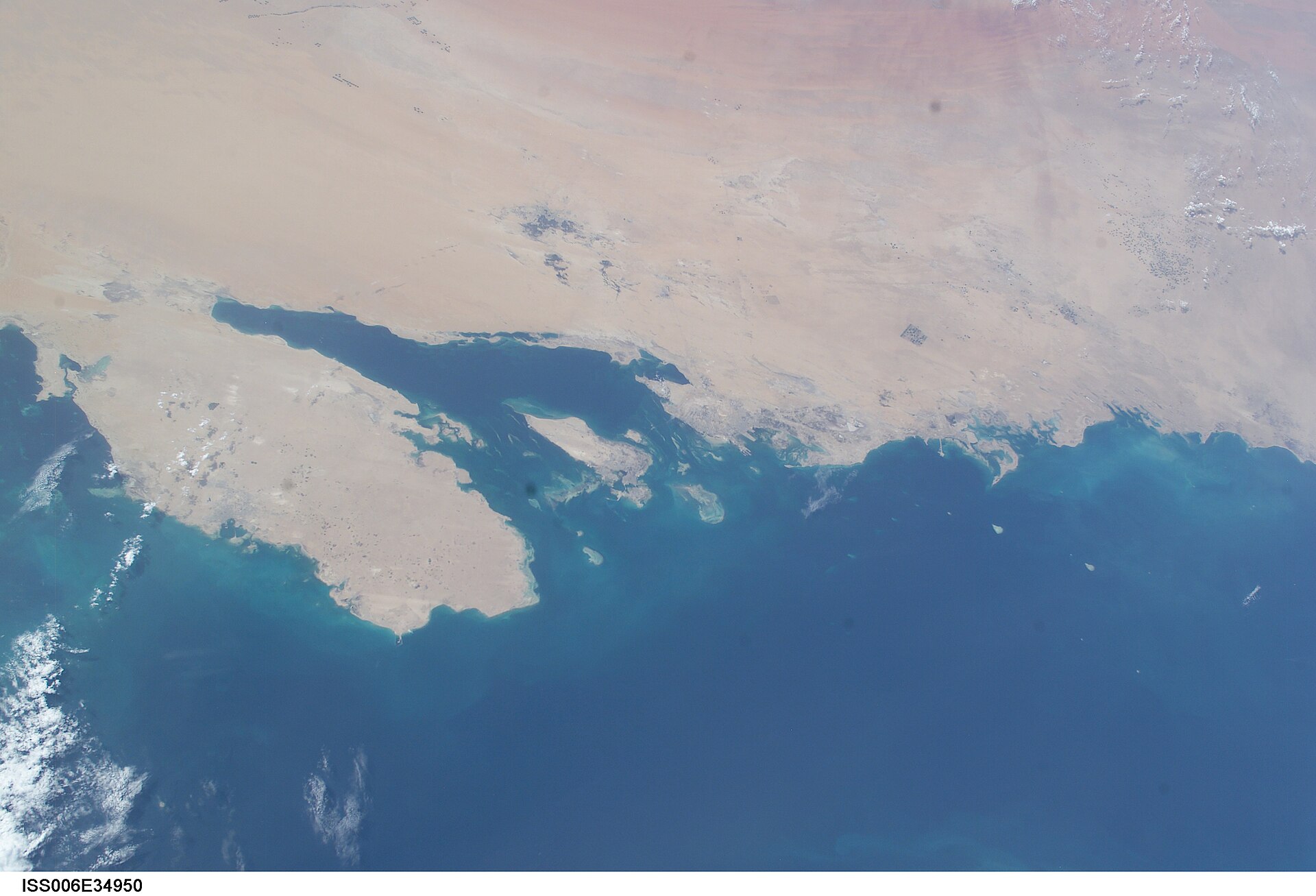 ISS satellite view of Bahrain island and the Saudi Arabian Eastern Province coastline on the Persian Gulf, site of Ras Tanura oil export terminal