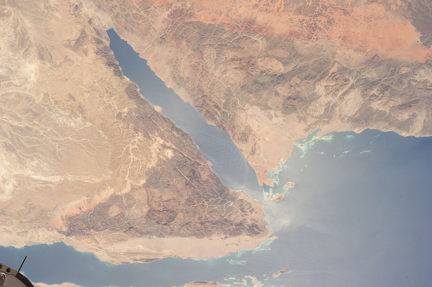 NASA ISS Expedition 36 photograph of Saudi Arabia Tabuk Province coastline along the Gulf of Aqaba — the terrain where NEOM construction was planned and partially excavated