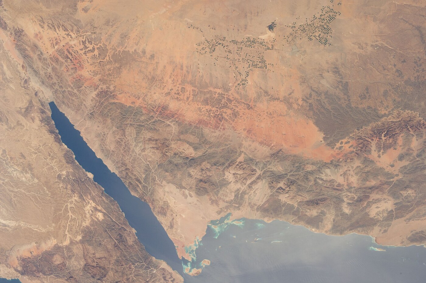 NASA ISS Expedition 36 aerial view of Saudi Arabia Tabuk desert and Gulf of Aqaba — the empty desert terrain where MBS announced NEOM in 2017