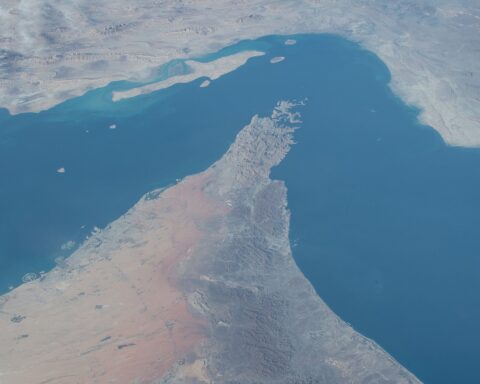 ISS Expedition 57 satellite photograph of the Strait of Hormuz chokepoint, showing the Musandam Peninsula of Oman flanked by the Persian Gulf to the west and Gulf of Oman to the east