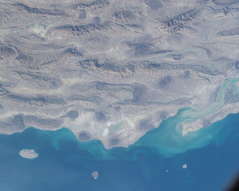 Iran southern coast and Persian Gulf from the International Space Station, ISS Expedition 66 — the rocky desert terrain of southern Iran meets the blue waters of the strait controlled by the PGSA