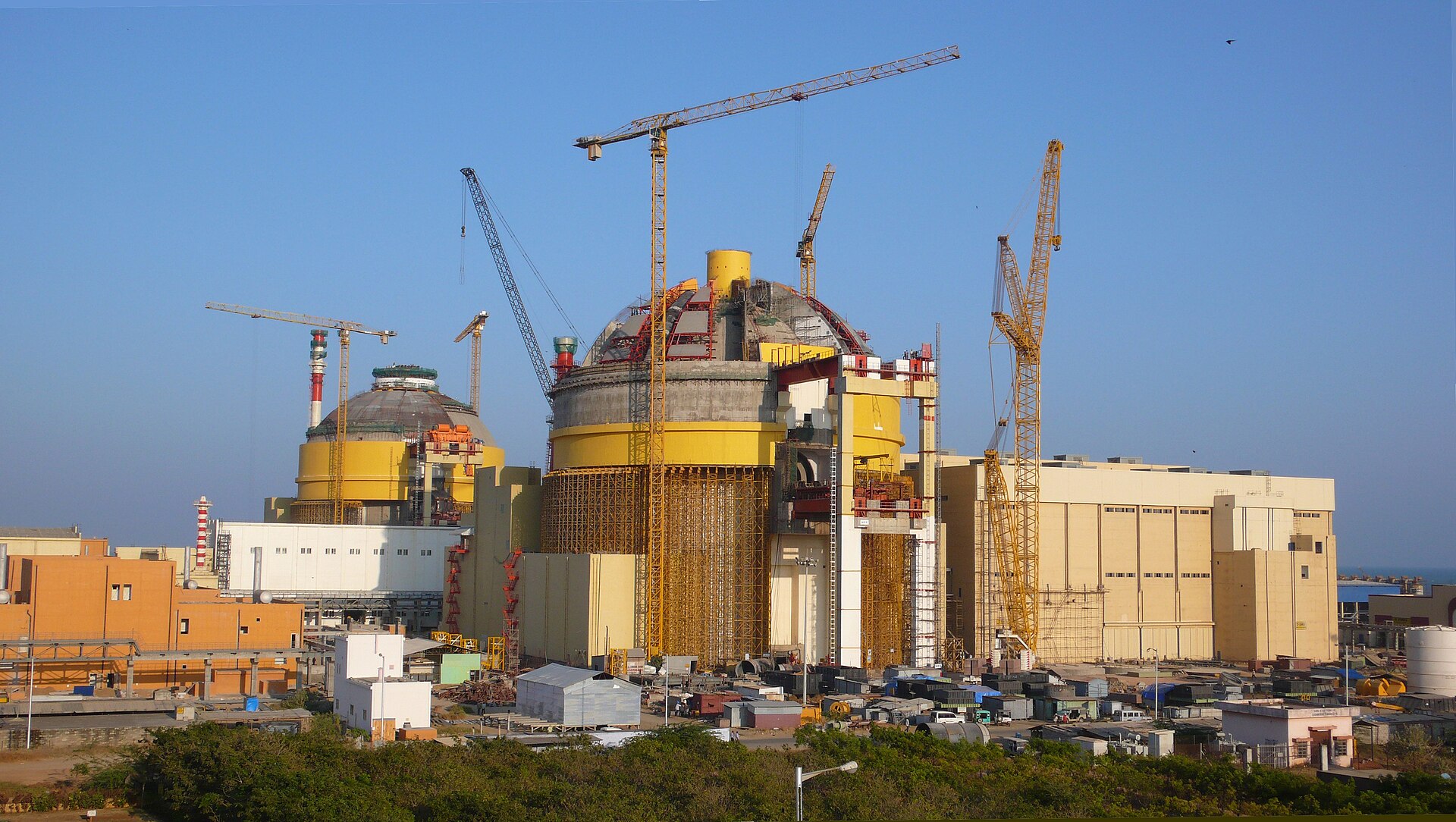 Two pressurized water reactor domes under construction at Kudankulam nuclear power plant, India — the same reactor design class Saudi Arabia plans for its Khor Duweihin facility