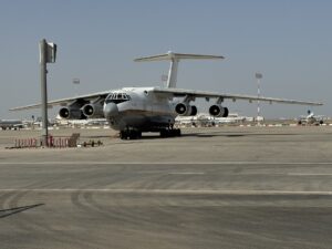 Kuwait International Airport tarmac apron with aircraft, terminal building visible in background