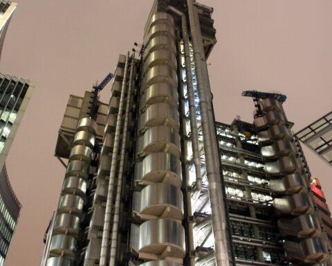 Lloyd's building Lime Street London at night — the distinctive inside-out architecture of the world's leading insurance market