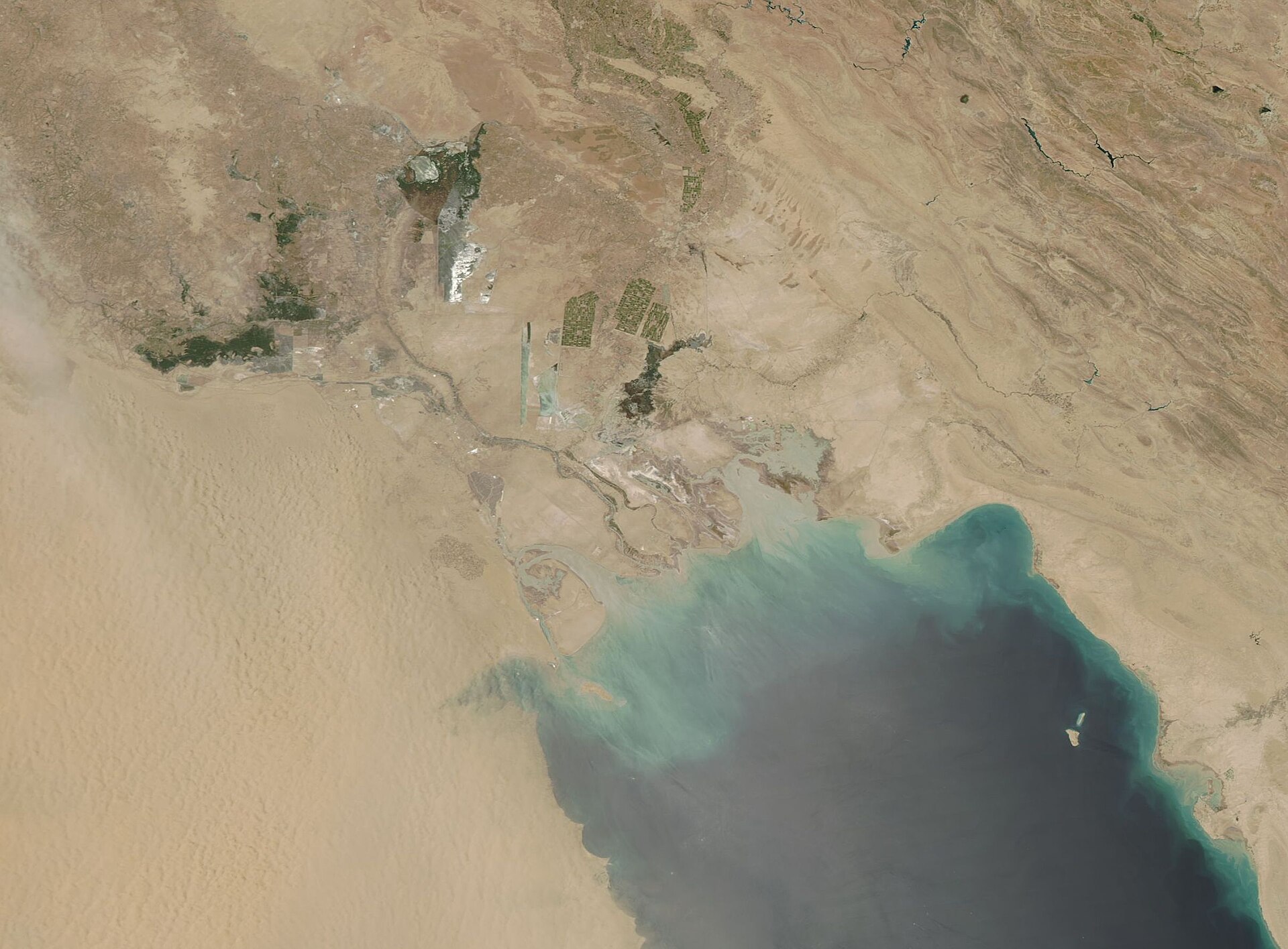 NASA MODIS satellite image of the northern Persian Gulf coastline showing the Kuwait-Iraq-Iran border zone and the upper Gulf waters where the MSC Sariska V was struck by Noor cruise missiles on June 1, 2026