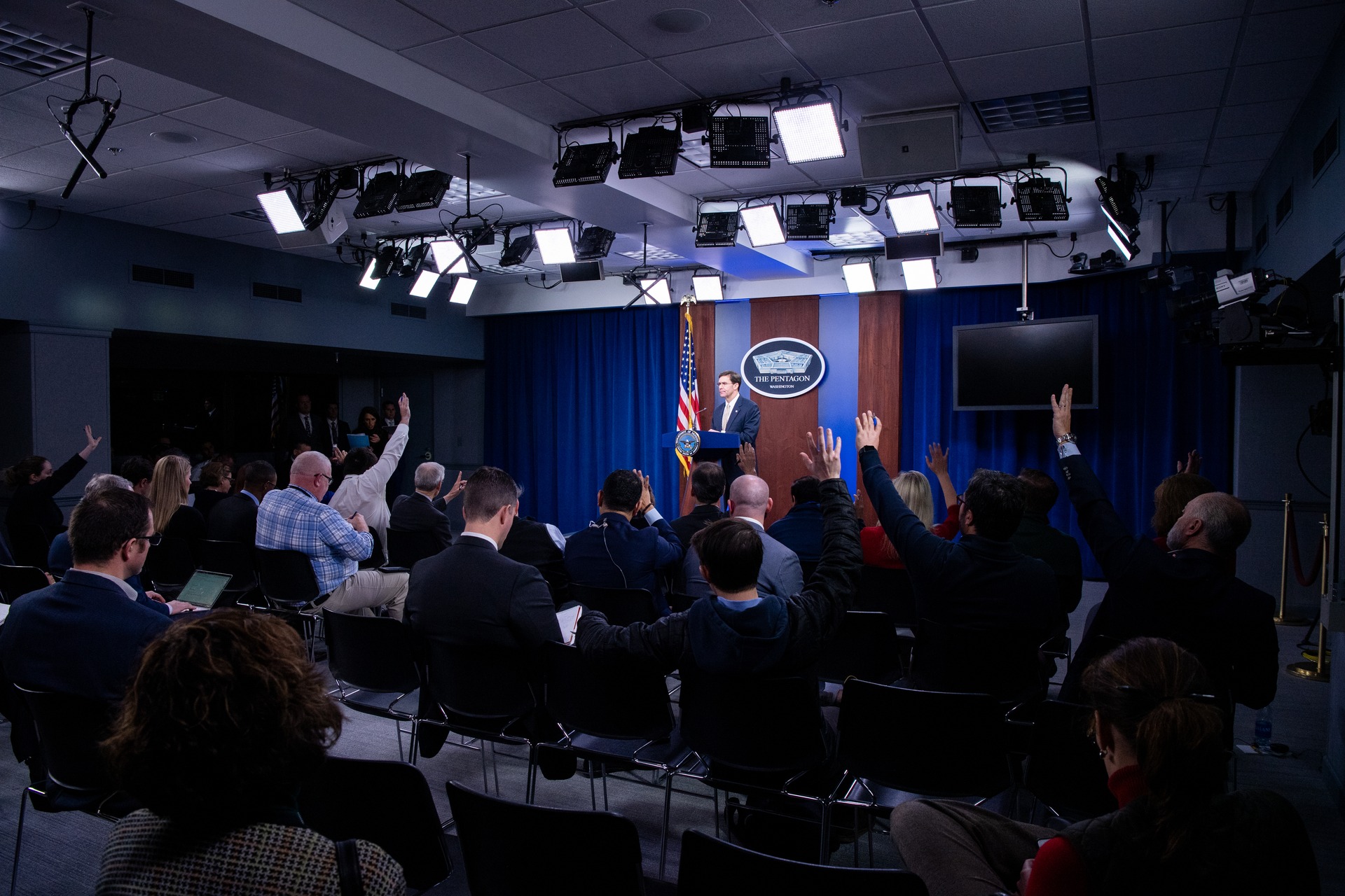 Pentagon briefing room press conference — the Defense Security Cooperation Agency uses this same podium to notify Congress of major arms sales; the emergency track that bypasses 30-day review has been invoked for every SOFA-holding Gulf state since February 28, but never for Saudi Arabia