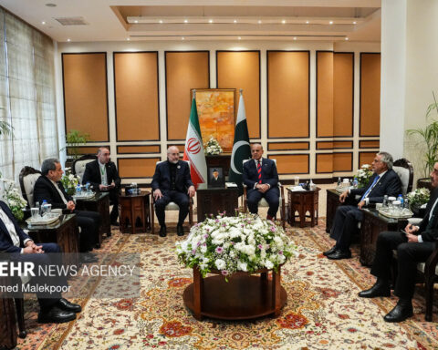 Pakistan PM Shehbaz Sharif meets the head of the Iranian delegation during the Minab 168 talks, April 2026, with Pakistan and Iran flags visible