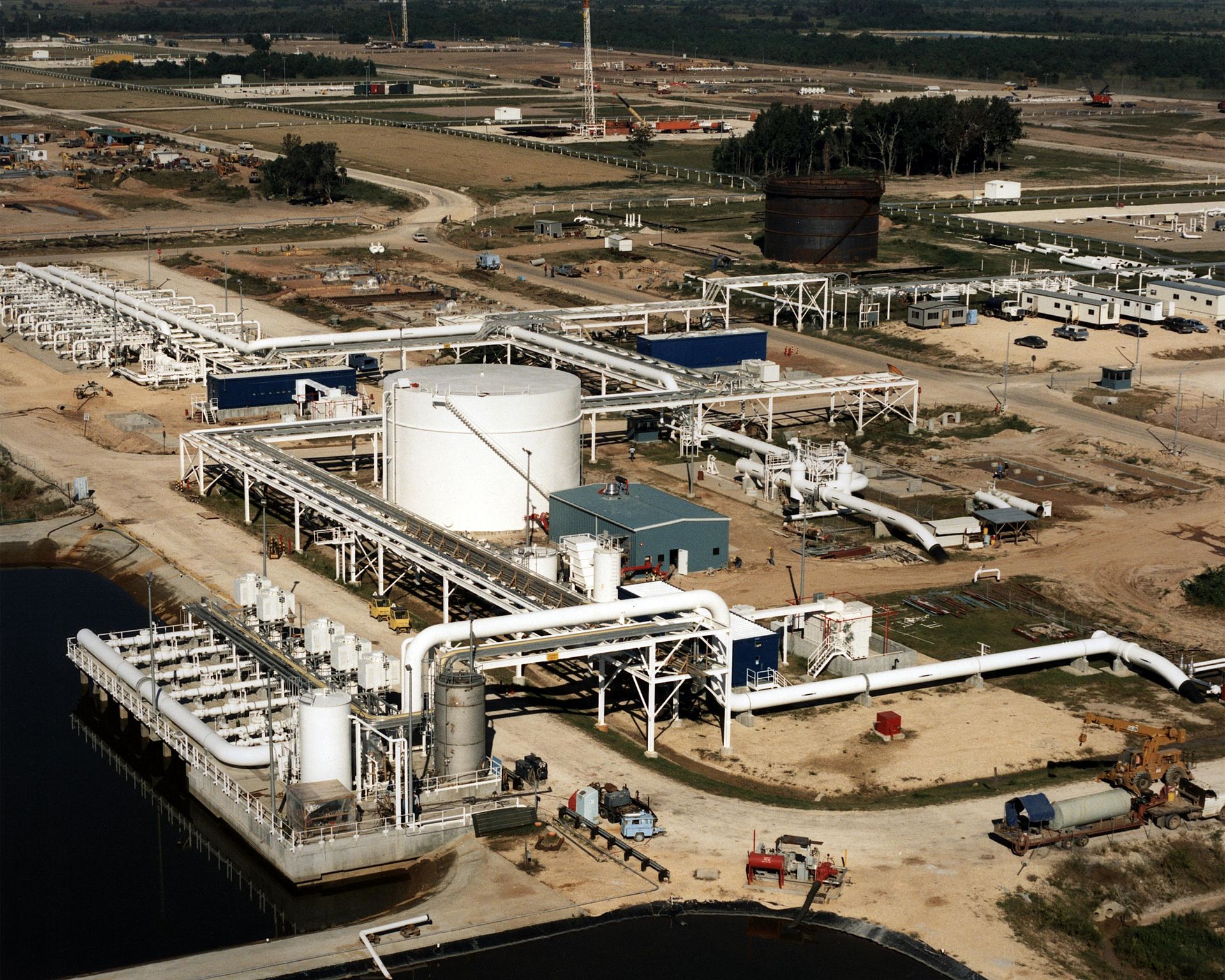 Aerial view of Bryan Mound Strategic Petroleum Reserve pump pad and processing infrastructure on the Texas Gulf Coast. The SPR recorded back-to-back all-time weekly drawdown records in May 2026.