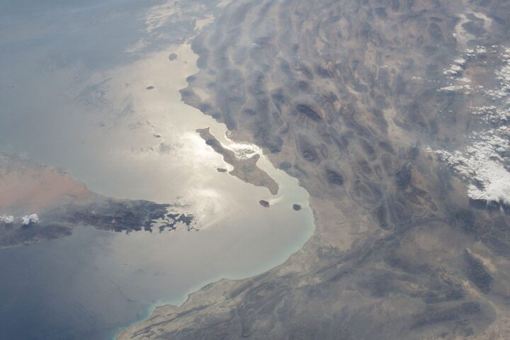 Strait of Hormuz and Musandam Peninsula from ISS-47, showing the 34-kilometre-wide chokepoint that controls access to the Persian Gulf — NASA/ISS public domain