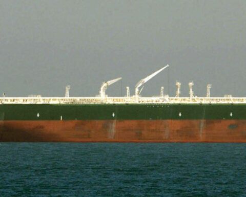 The supertanker AbQaiq, a Saudi Aramco VLCC crude oil carrier, at anchor in the Gulf. Yanbu is the Red Sea terminus of the East-West Pipeline — the vessel type that carries Saudi crude exports through Bab el-Mandeb to Asian buyers.